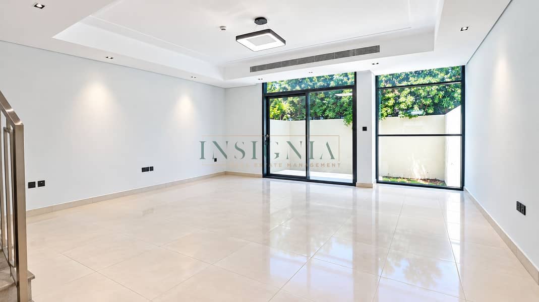 6 Bright Minimalist Living Room with Glass Doors. png