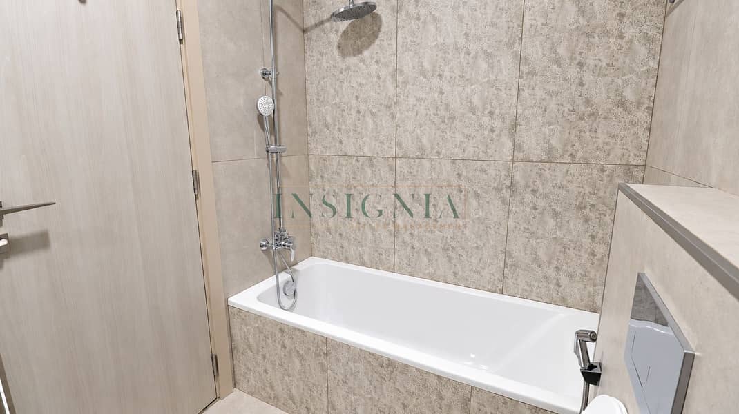 10 Bright Modern Stone-Tiled Bathroom. png