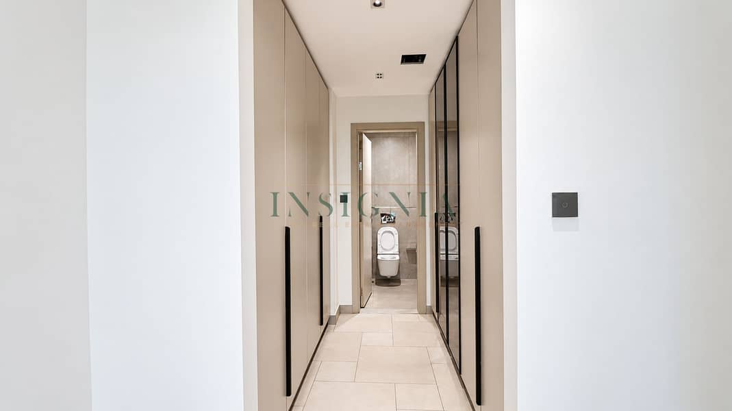 11 Minimalist Beige Hallway to Bathroom. png