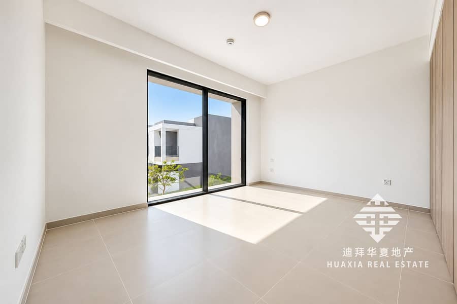 4 Sunlit Minimalist Room with Sliding Glass Doors. png