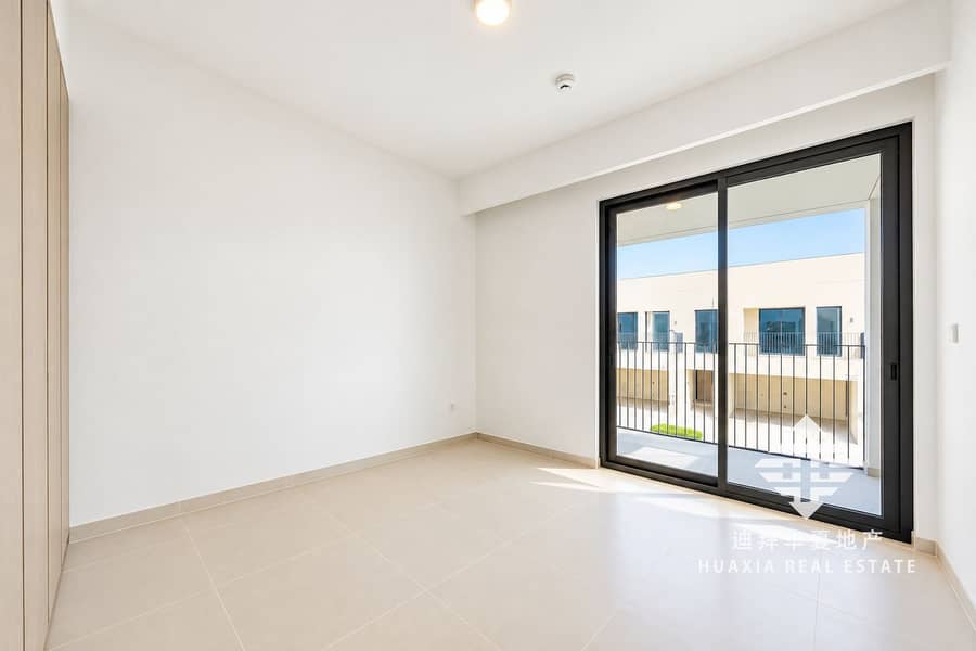 5 Bright Minimalist Room with Balcony Views. png