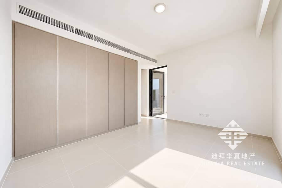6 Bright Minimalist Bedroom with Wardrobe and Balcony Door. png