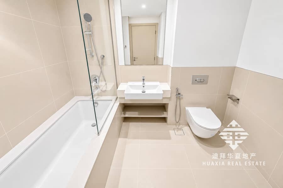 7 Bright Minimalist Beige Bathroom. png