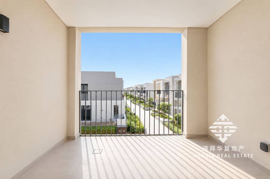 18 Sunlit Minimalist Balcony Overlooking Modern Villas. png