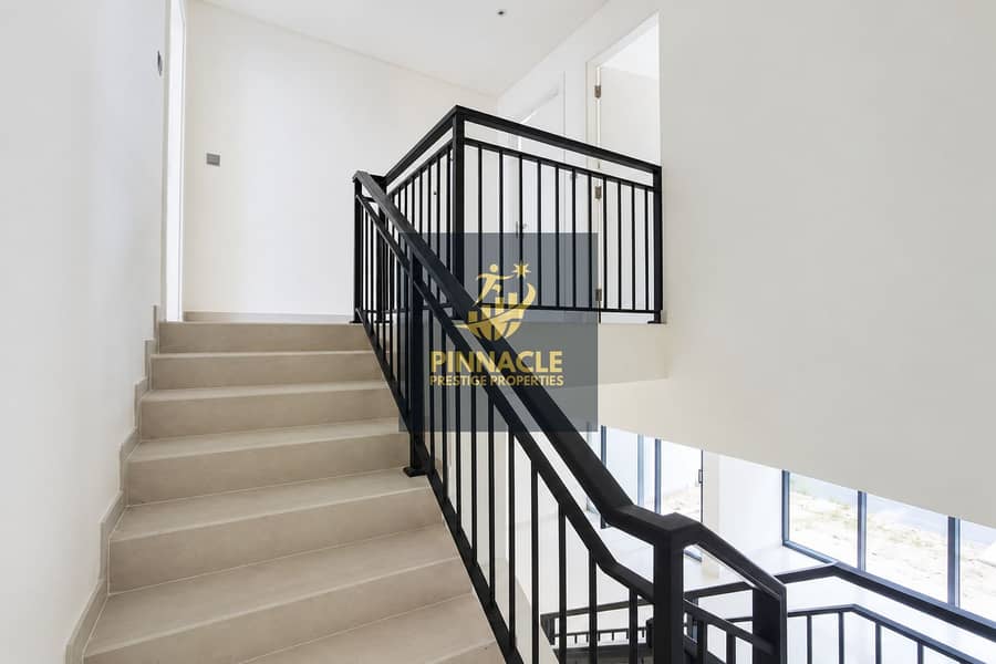 8 Bright Modern Stairwell with Black Railings. png