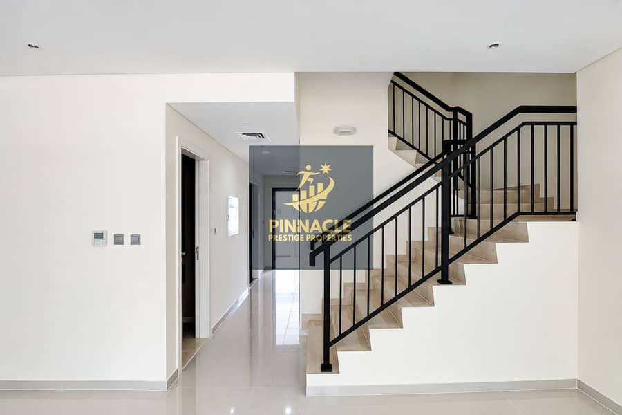 9 Modern Hallway with Geometric Staircase. png