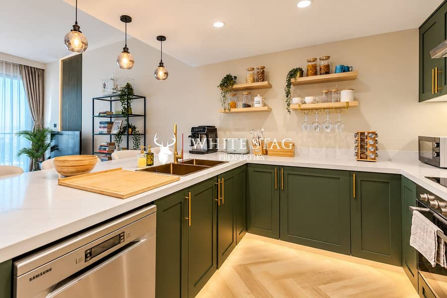 11 Warm Modern Green Kitchen Living Space. png