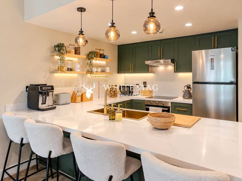 12 Warm Scandinavian Kitchen with Marble Island. png