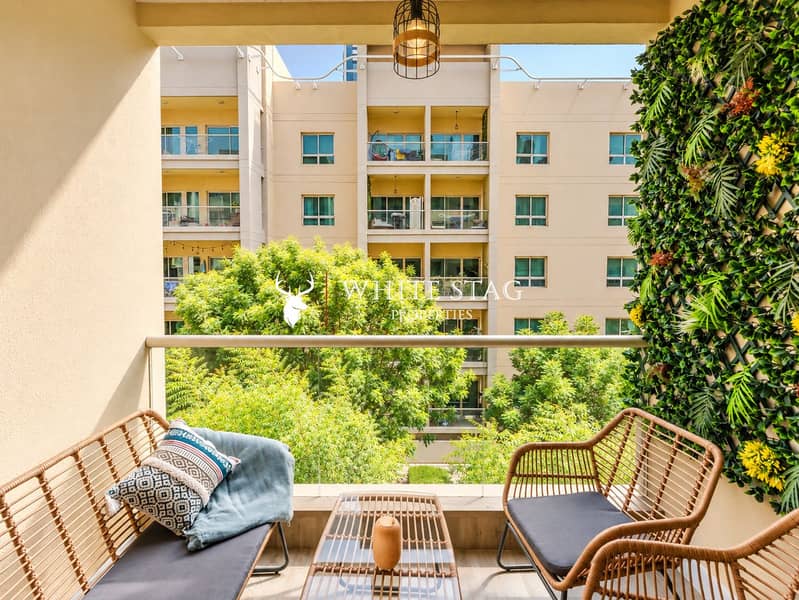 21 Sunlit Balcony Retreat with Lush Greenery. png