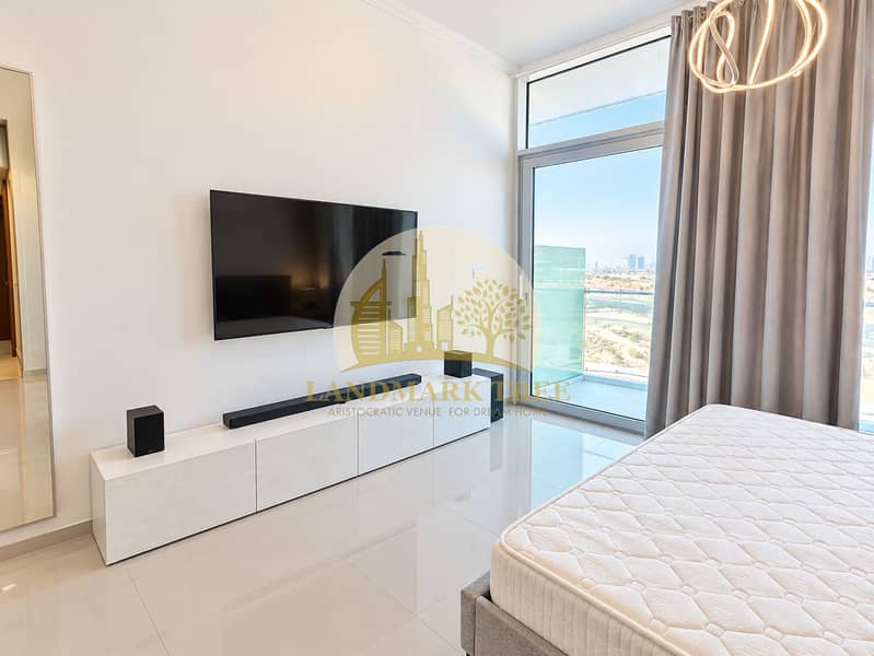 4 Sunlit Modern Bedroom with Balcony View. png