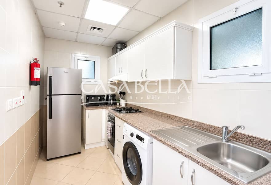 3 Bright Modern Galley Kitchen-Laundry. png