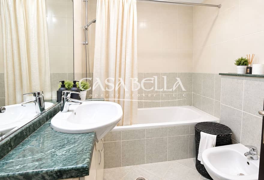 6 Bright Modern Bathroom with Green Marble Accents. png