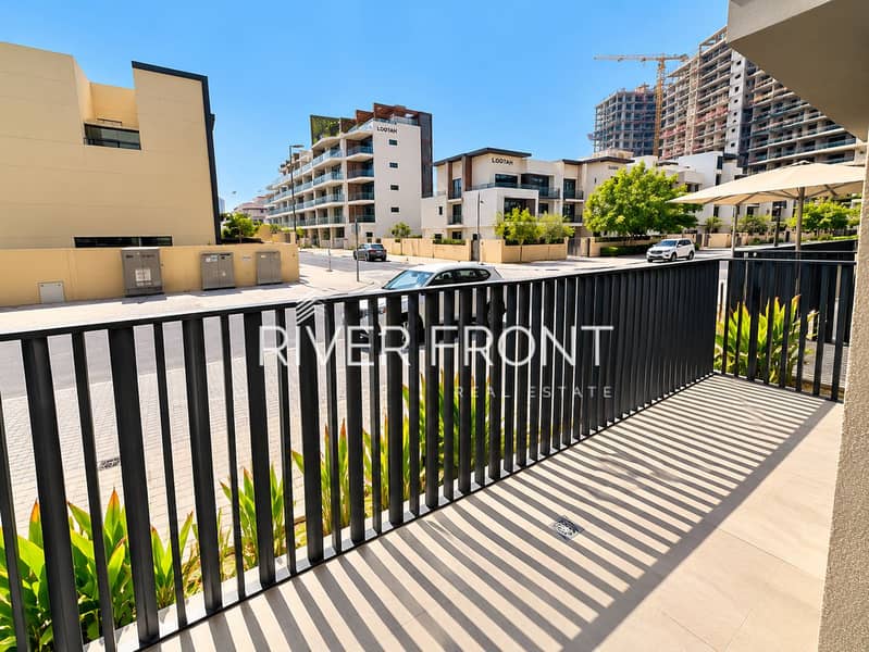 6 Sunlit Balcony Overlooking Modern Neighborhood. png