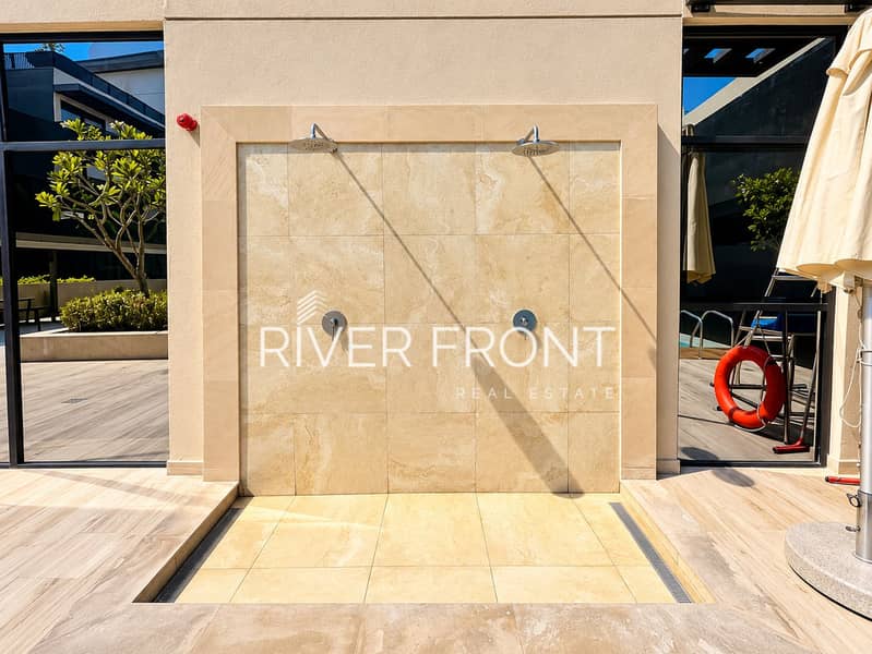 13 Sunlit Luxury Poolside Shower Alcove. png