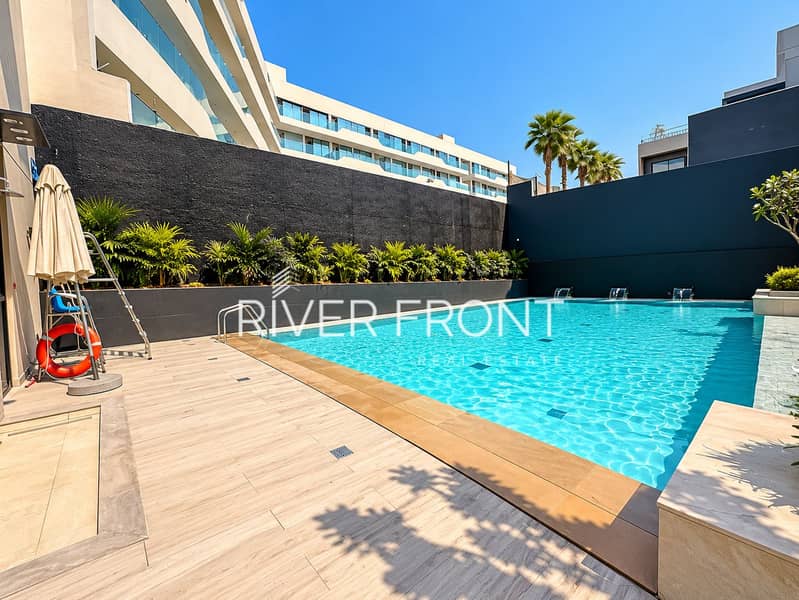 14 Sunlit Modern Resort Pool Courtyard. png