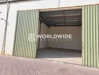 Warehouse for Rent in Al Bahia, Ajman - Cleaned industrial interior with red pipes-4. png Warehouse for Rent in Al Bahia, Ajman - Cleaned industrial interior with red pipes-4. png