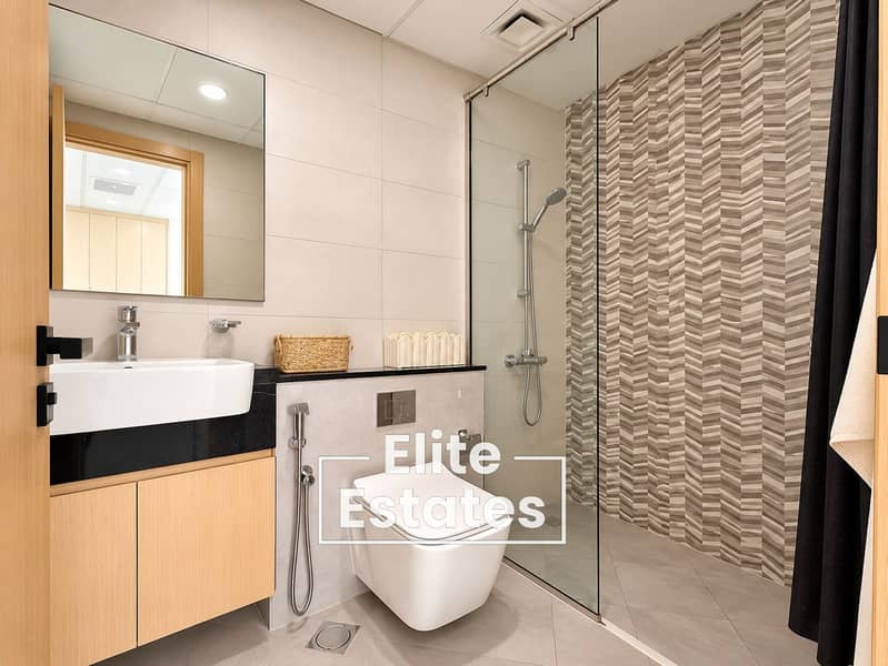 12 Minimalist Ensuite with Chevron Shower Wall. png