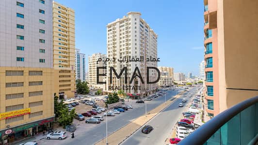 阿尔努艾米亚, 阿治曼 3 卧室单位待售 - Sunny Middle Eastern Cityscape from Balcony. png 阿尔努艾米亚, 阿治曼 3 卧室单位待售 - Sunny Middle Eastern Cityscape from Balcony. png