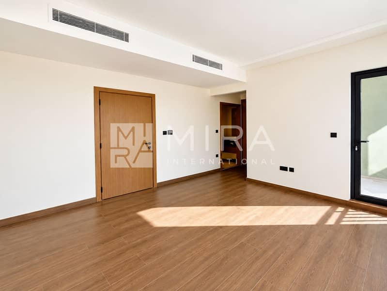 6 Sunlit hallway with bedroom and terrace doors-7