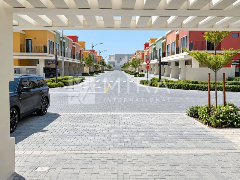 12 Colorful Townhouse Street Under White Pergola-12