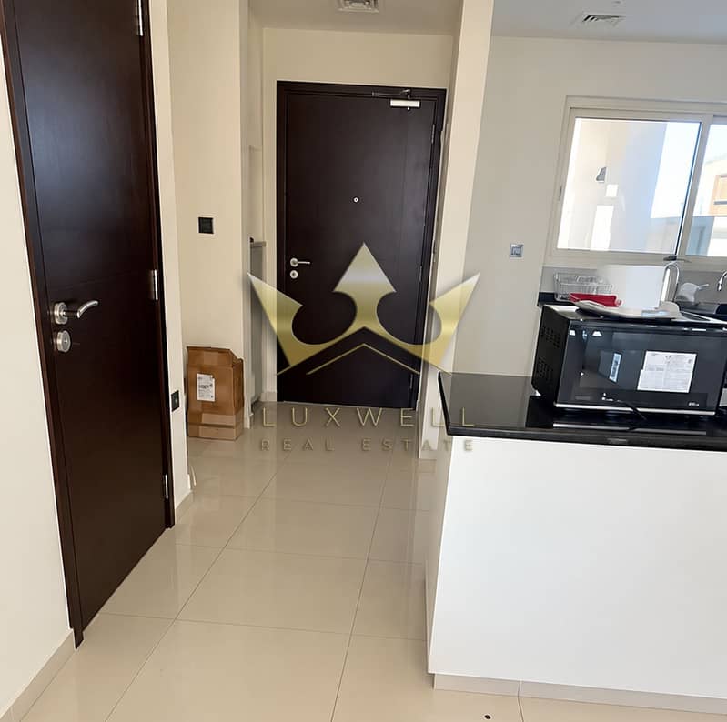 3 Modern Apartment Hallway and Kitchen. png