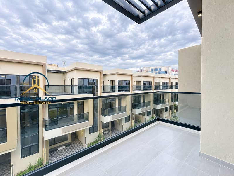 17 Modern Townhouses Under Cloudy Skies. png