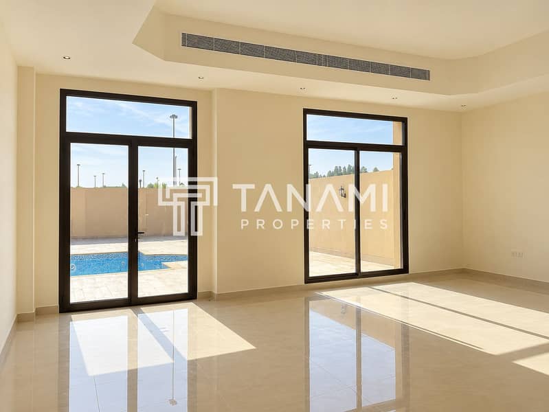 3 Sunlit Minimalist Living Room with Pool Views. png