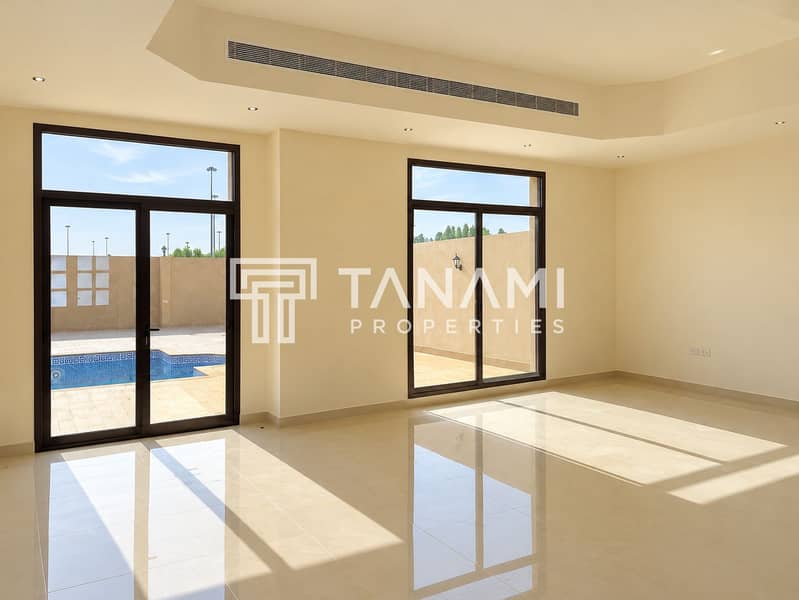 5 Sunlit Minimalist Living Room with Pool View. png