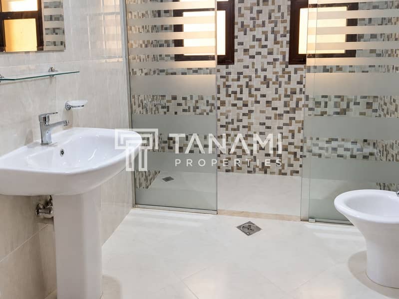 9 Warm Modern Mosaic Bathroom. png