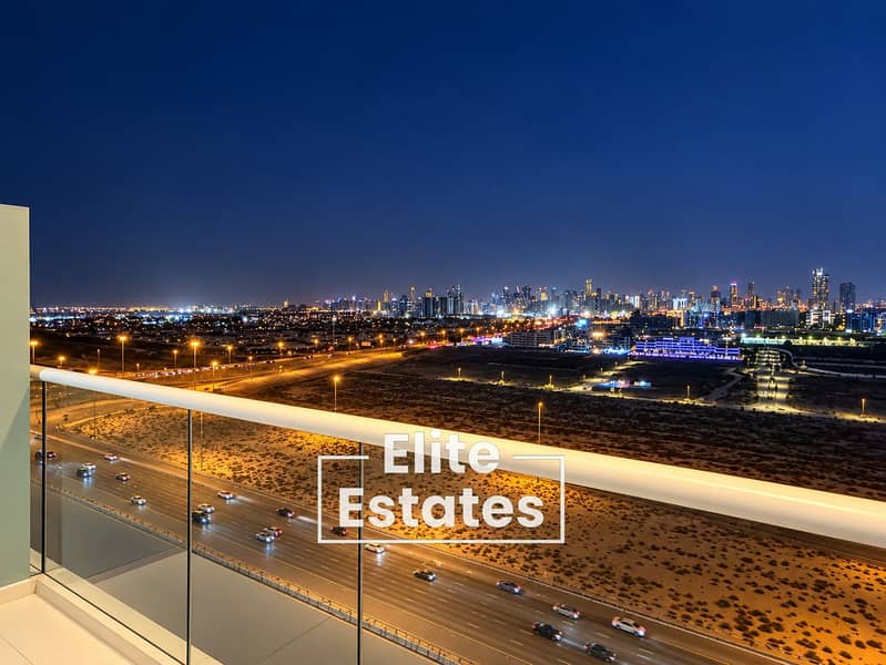 8 High-Rise Balcony Overlooking City Lights. png