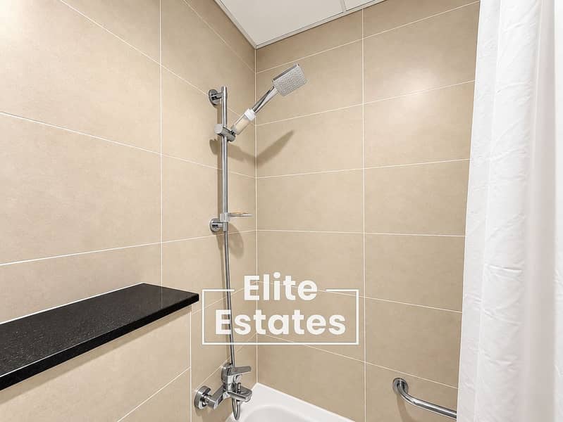 14 Modern Beige Tiled Shower Corner. png