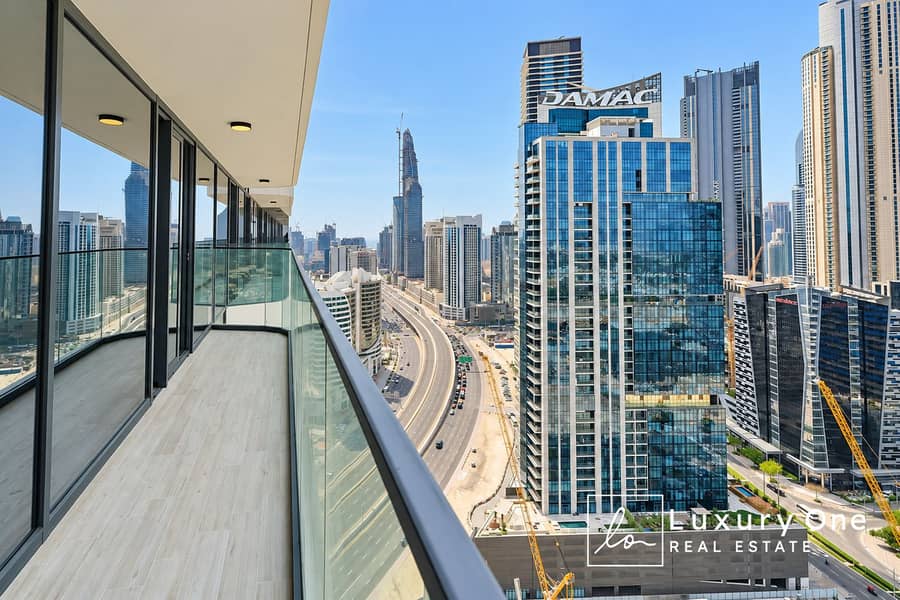 8 Sunlit Balcony Overlooking Modern Skyline. png