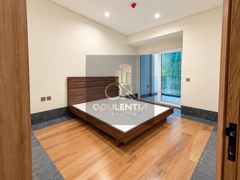 3 Bright Minimalist Bedroom with Balcony Glazing. png
