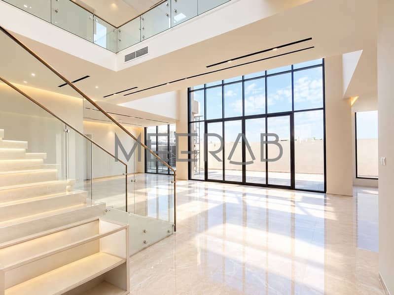 2 Modern Double-Height Foyer with Floating Staircase. png