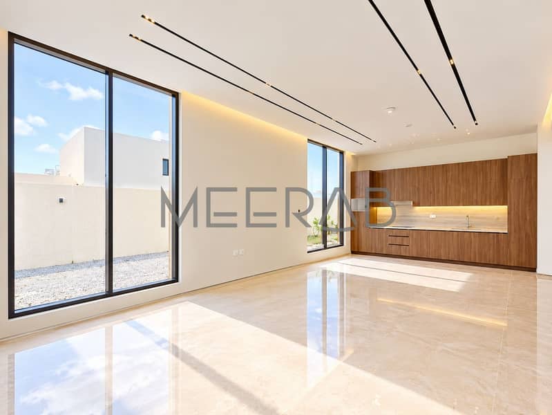 6 Sunlit Minimalist Open-Plan Kitchen Interior. png