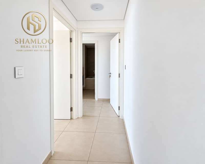 5 Bright Minimalist Apartment Hallway. png