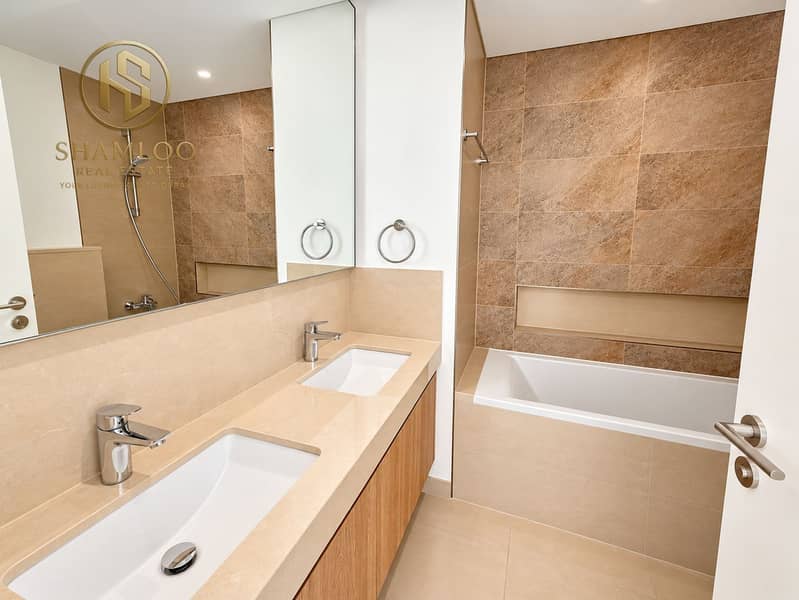 6 Modern Warm-Toned Minimalist Bathroom. png