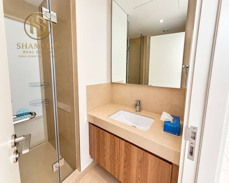 7 Modern Beige Vanity and Glass Shower. png