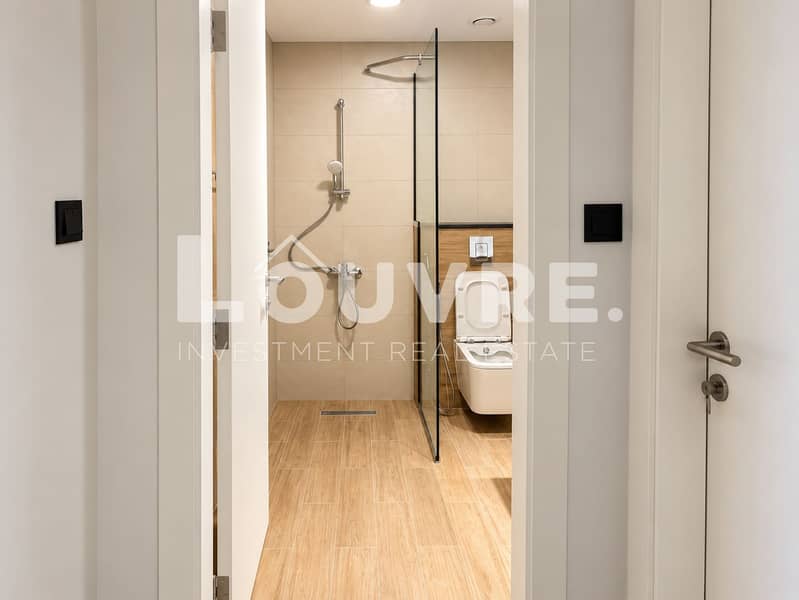 7 Modern Bathroom Through Open Doorway. png