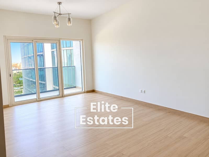 4 Bright Minimalist Living Room with Balcony Views. png