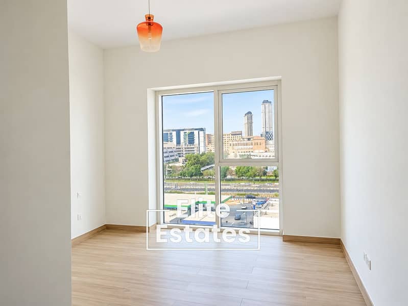 6 Bright Modern Room with City Skyline View. png
