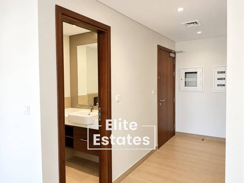 9 Modern Hallway with Open Bathroom. png