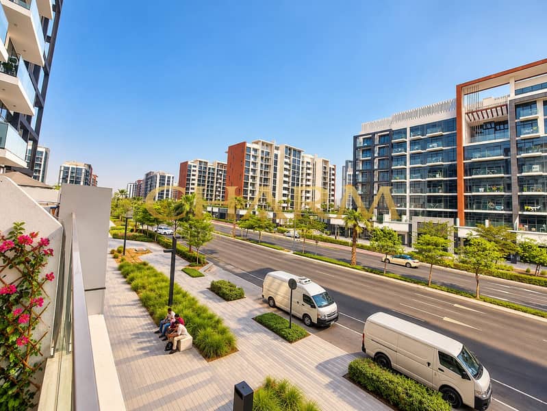 9 Sunny Modern Boulevard from a Balcony. png