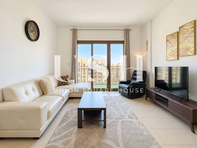 4 Bright Modern Living Room with Balcony Views. png