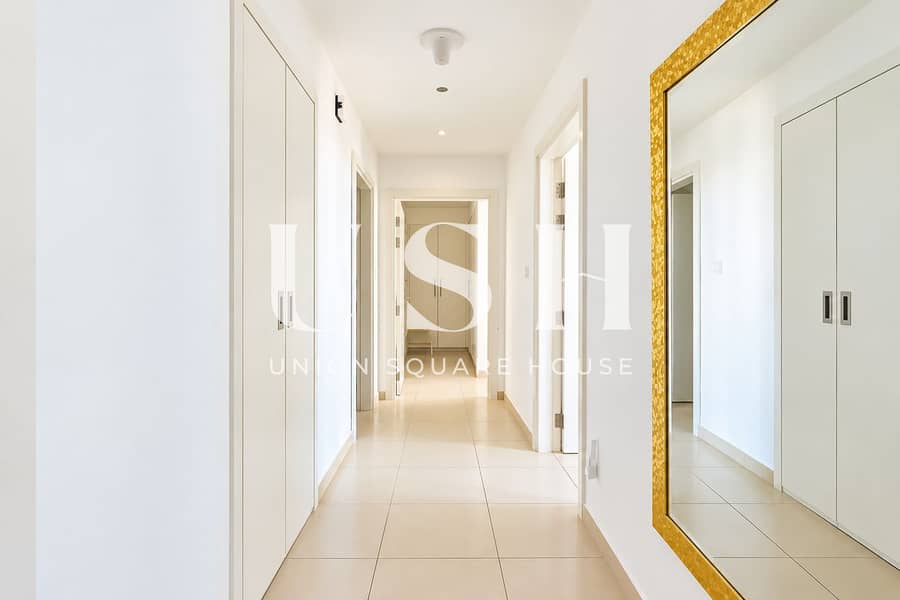 6 Minimalist Hallway with Golden Mirror. png