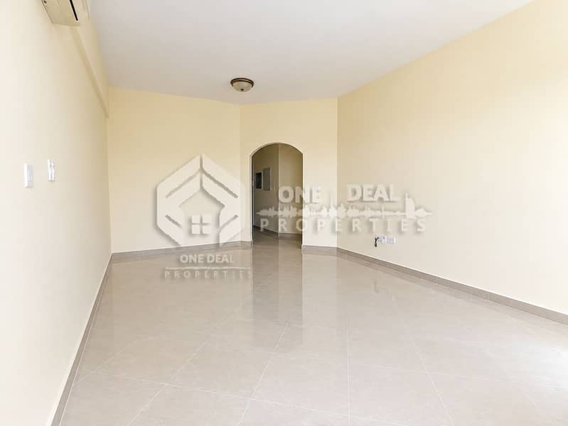 2 Bright Minimalist Room with Arched Doorway. png