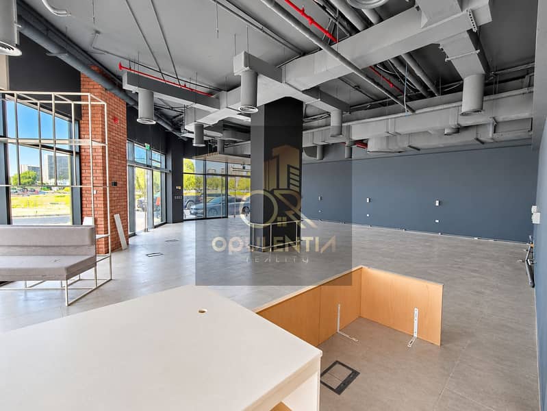 2 Bright Industrial Showroom Interior. png