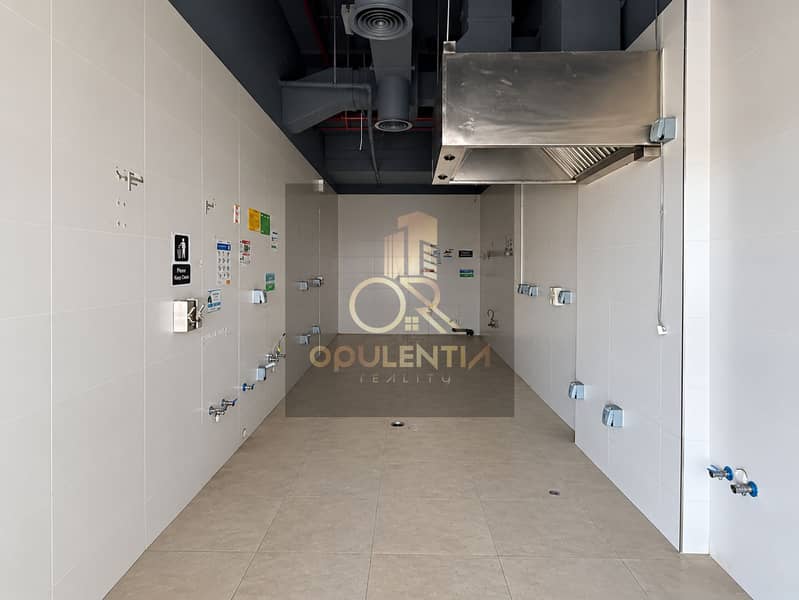 6 Empty Tiled Commercial Kitchen Utility Corridor. png