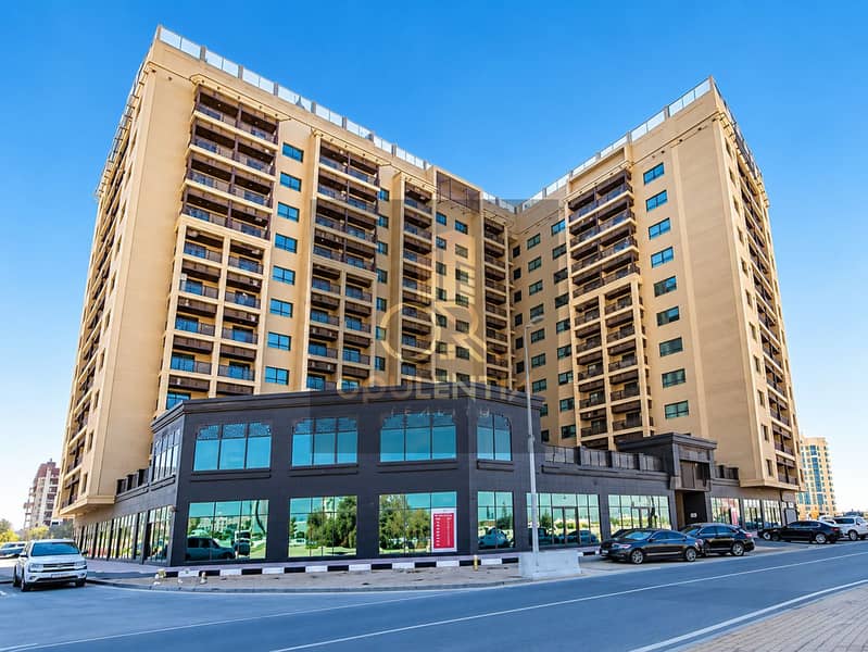 7 Modern Beige Towers with Dark Podium. png