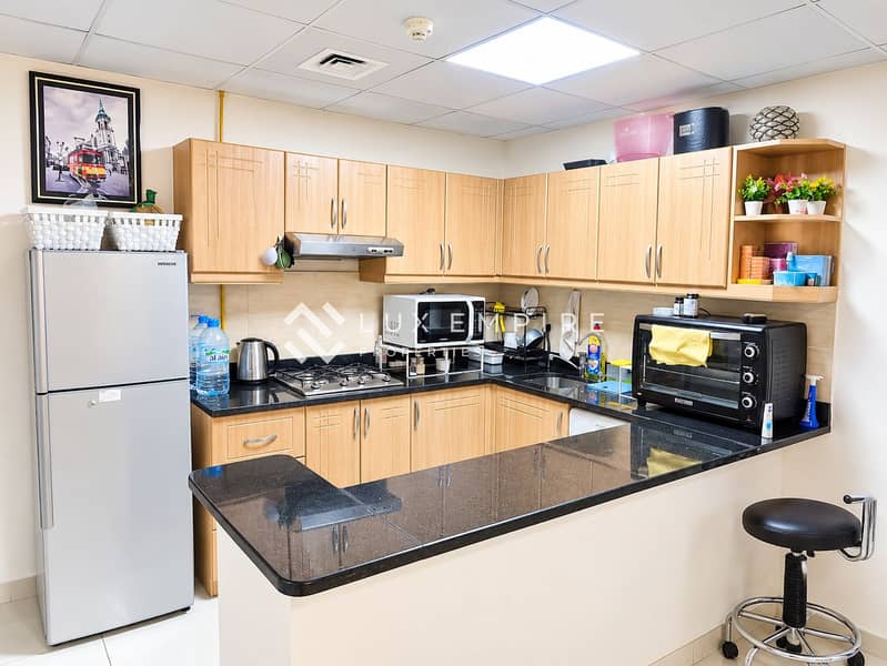 3 Bright Modern L-Shaped Kitchen Interior. png